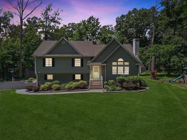 311 Myers Corners Rd, Wappingers Falls, NY 12590 - view of front facade with a playground, a chimney, and a yard