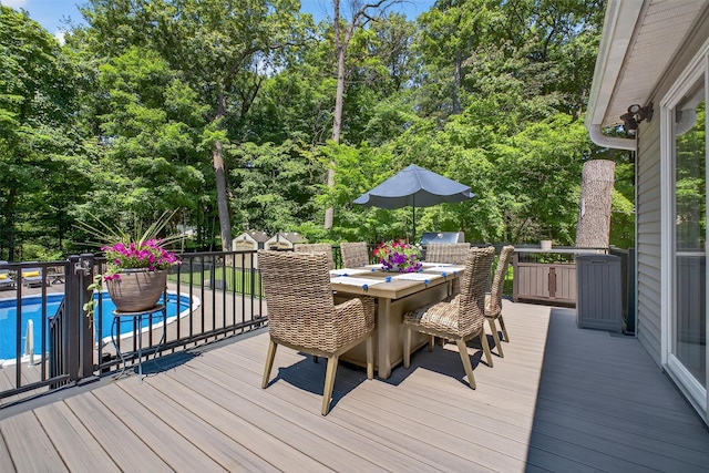 311 Myers Corners Rd, Wappingers Falls, NY 12590 - wooden deck featuring outdoor dining area and view of wooded area
