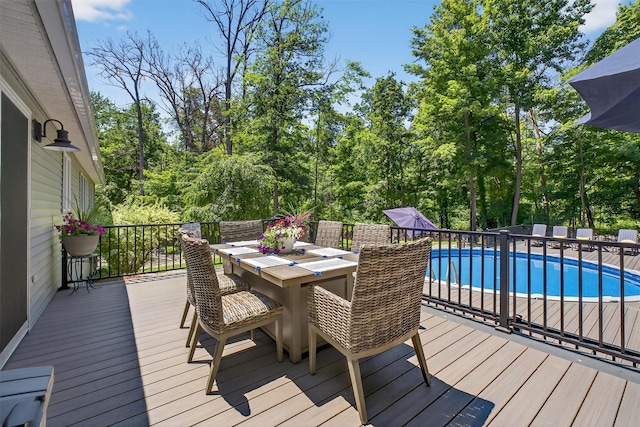 311 Myers Corners Rd, Wappingers Falls, NY 12590 - wooden deck featuring outdoor dining area and view of wooded area