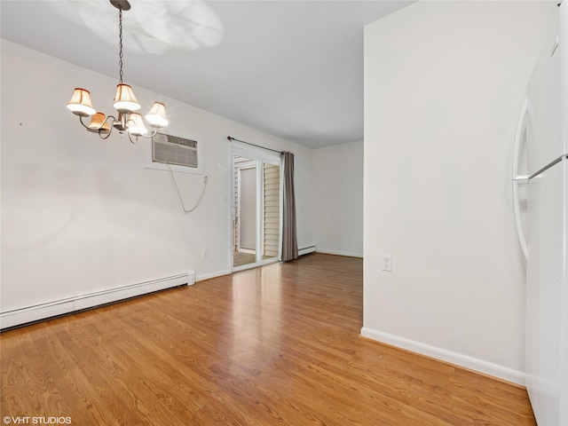 4H Locust Ct Unit H, Fishkill, NY 12524 - unfurnished room featuring a chandelier, a baseboard radiator, light wood finished floors, and a wall unit AC