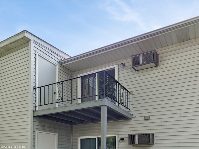 4H Locust Ct Unit H, Fishkill, NY 12524 - view of side of home featuring a balcony and a wall mounted air conditioner