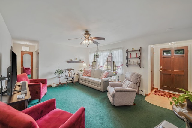 12 Pine Cone St, Middle Island, NY 11953 - living area featuring a baseboard radiator, a ceiling fan, and carpet