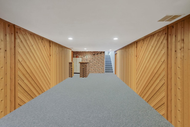 12 Pine Cone St, Middle Island, NY 11953 - corridor with wood walls, carpet floors, and recessed lighting