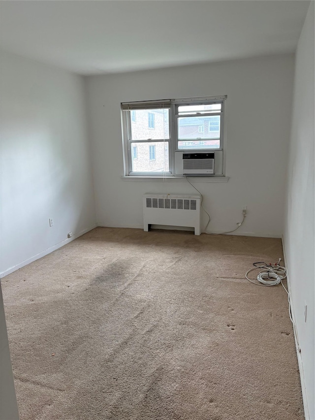 68 Loring Ave, Yonkers, NY 10704 - unfurnished room with radiator heating unit, carpet, and cooling unit