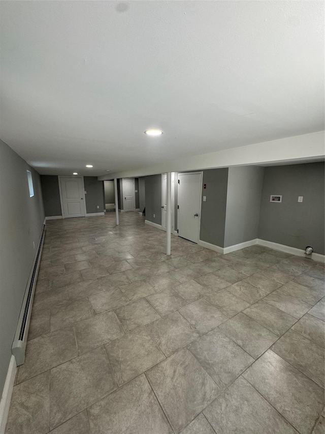 1611 Research Ave, Bronx, NY 10465 - finished basement featuring a baseboard radiator and recessed lighting