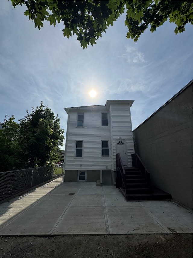 1611 Research Ave, Bronx, NY 10465 - rear view of house with a patio area