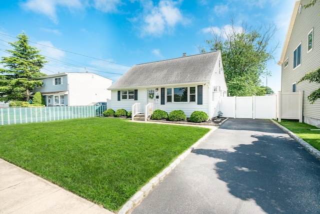 14 Crocus Ct, West Babylon, NY 11704 - view of front of house featuring asphalt driveway and roof with shingles