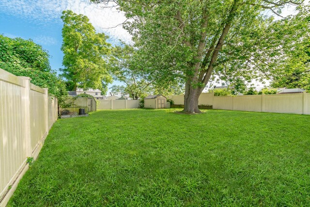 14 Crocus Ct, West Babylon, NY 11704 - fenced backyard with a shed