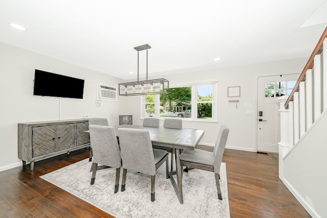 14 Crocus Ct, West Babylon, NY 11704 - dining space featuring stairs, dark wood-style flooring, recessed lighting, and a wall mounted air conditioner