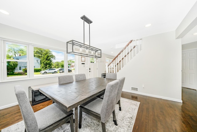 14 Crocus Ct, West Babylon, NY 11704 - dining room featuring stairs, dark wood finished floors, and recessed lighting