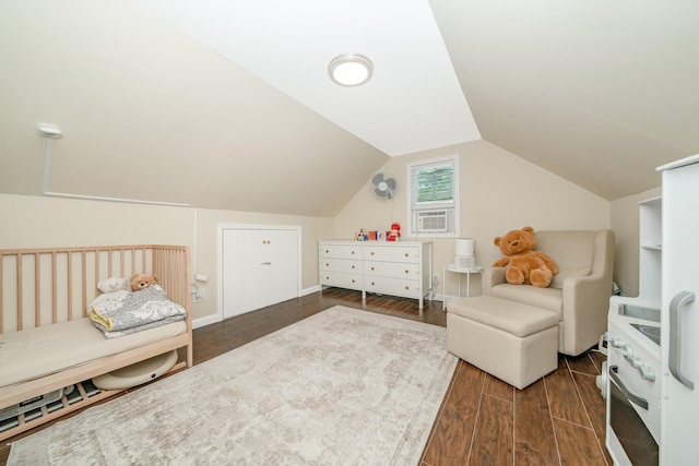 14 Crocus Ct, West Babylon, NY 11704 - bedroom featuring wood finished floors, vaulted ceiling, and cooling unit