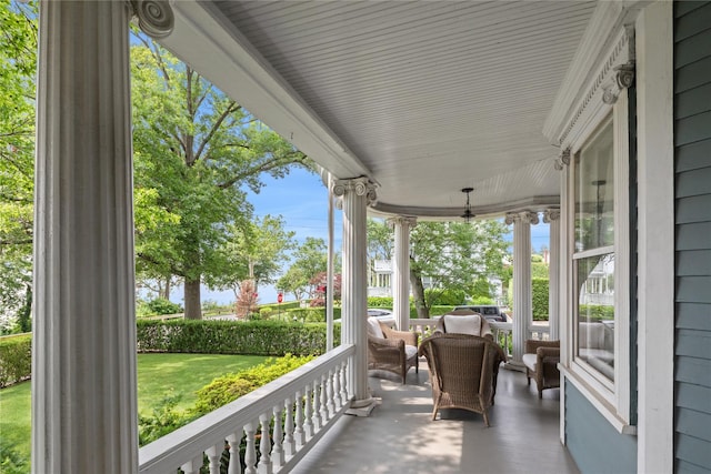 28 Shore Rd, Douglaston, NY 11363 - wooden porch featuring a lawn