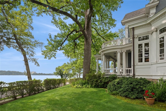 28 Shore Rd, Douglaston, NY 11363 - view of grassy yard with a balcony and a water view