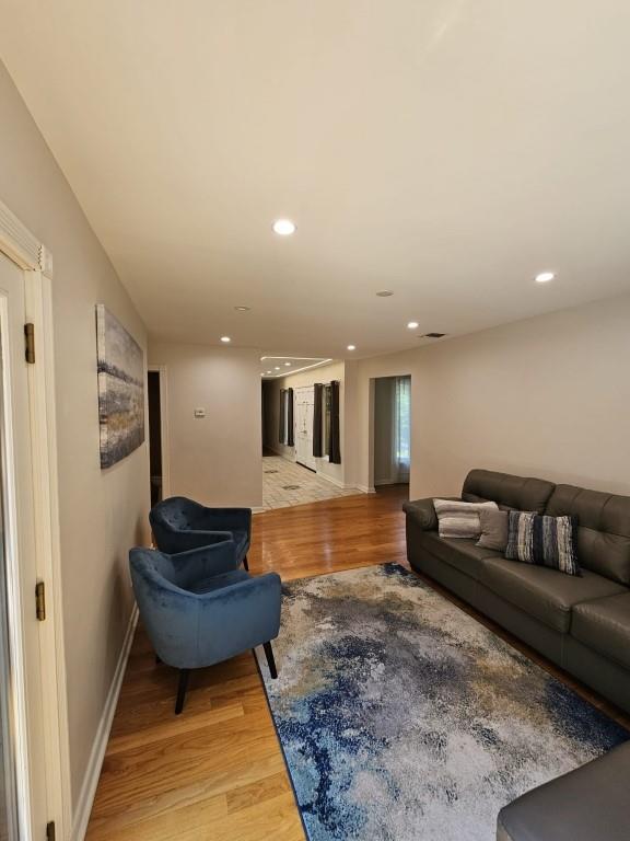 11 Cliff Ct, Monroe, NY 10950 - living room featuring light wood-style flooring, recessed lighting, and attic access