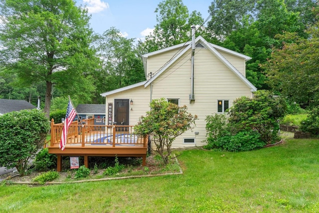22 Whitney Dr, Call Listing Agent, NY 12018 - back of property with a wooden deck and a yard