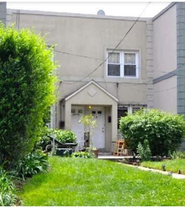 183-14-16 140th Ave, Springfield Gardens, NY 11413 - entrance to property featuring a yard