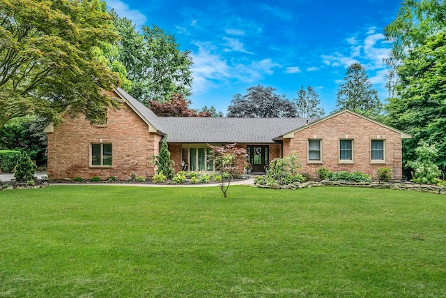 6 Memas Ct, Dix Hills, NY 11746 - view of front of home featuring brick siding, a front yard, and roof with shingles