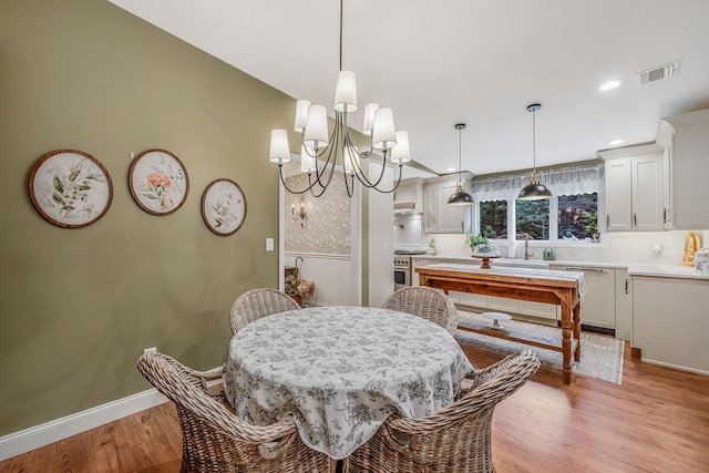 6 Memas Ct, Dix Hills, NY 11746 - dining room featuring light wood finished floors, a chandelier, and recessed lighting