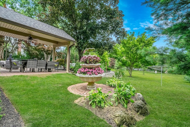 6 Memas Ct, Dix Hills, NY 11746 - view of green lawn featuring ceiling fan and a patio area