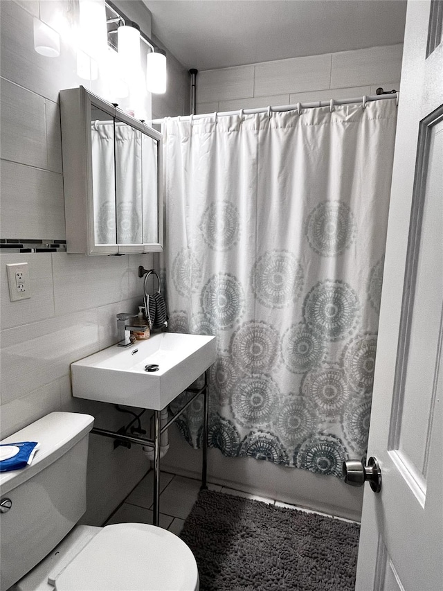 82-13 32nd Ave, East Elmhurst, NY 11370 - bathroom with toilet and shower / tub combo with curtain