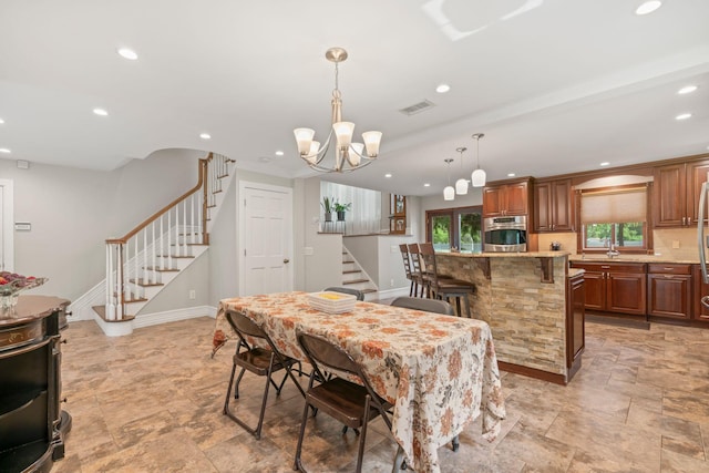 20 Tulipwood Dr, Commack, NY 11725 - dining space featuring stairs, light stone finish flooring, recessed lighting, and a chandelier