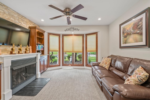 20 Tulipwood Dr, Commack, NY 11725 - living area with a ceiling fan, recessed lighting, a fireplace, and light colored carpet