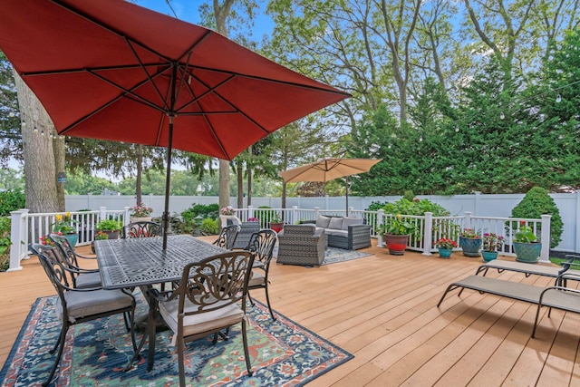 20 Tulipwood Dr, Commack, NY 11725 - wooden deck with an outdoor hangout area, a fenced backyard, and outdoor dining space