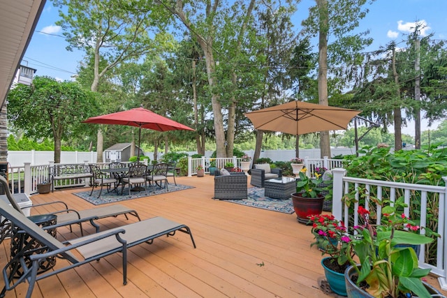 20 Tulipwood Dr, Commack, NY 11725 - deck with outdoor dining space, an outdoor living space, and a fenced backyard