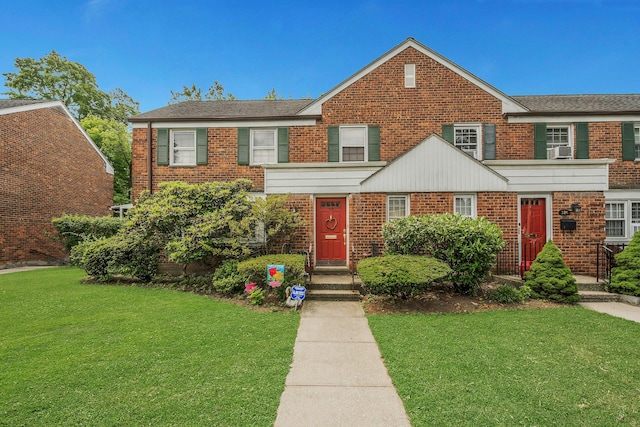 118 Robins Rd Unit 118, New Rochelle, NY 10801 - view of property featuring a front lawn and brick siding
