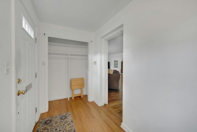 118 Robins Rd Unit 118, New Rochelle, NY 10801 - corridor with light wood finished floors and baseboards