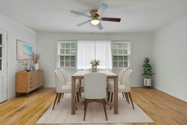 118 Robins Rd Unit 118, New Rochelle, NY 10801 - dining space with crown molding, light wood-type flooring, and ceiling fan