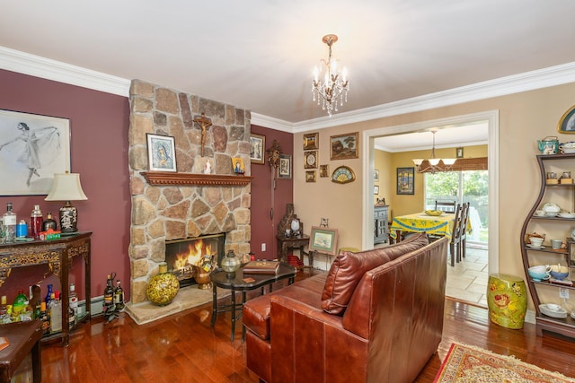 224 Moriches Middle Island Rd, Shirley, NY 11967 - living area featuring a chandelier, crown molding, wood finished floors, and a stone fireplace