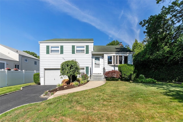 2 Nautilus Ave, Plainview, NY 11803 - split level home featuring an attached garage, driveway, and a chimney