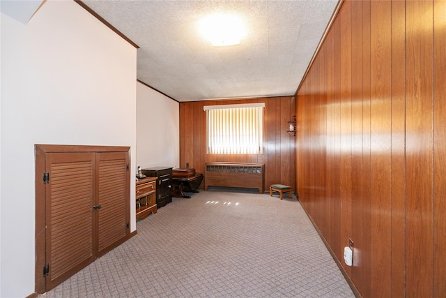 2 Nautilus Ave, Plainview, NY 11803 - hall with wooden walls, carpet, and ornamental molding