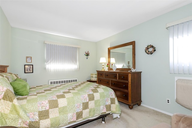 2 Nautilus Ave, Plainview, NY 11803 - bedroom featuring light colored carpet and radiator heating unit