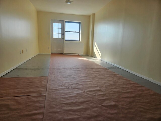 87-30 62nd Ave Unit 7F, Rego Park, NY 11374 - carpeted spare room with baseboards