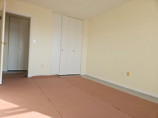 87-30 62nd Ave Unit 7F, Rego Park, NY 11374 - unfurnished bedroom with a closet