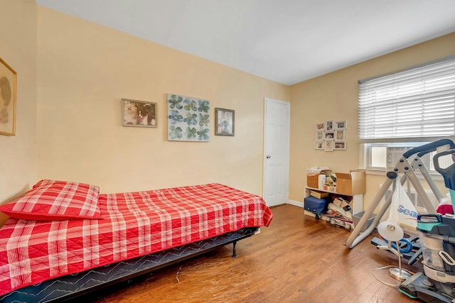124 Robins Unit 124, New Rochelle, NY 10801 - bedroom featuring wood finished floors and cooling unit