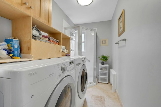 124 Robins Unit 124, New Rochelle, NY 10801 - laundry area with independent washer and dryer, light tile patterned flooring, radiator, and cabinet space