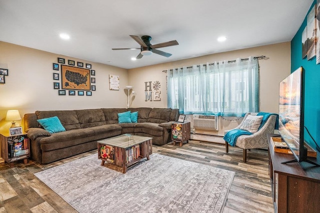 42 Richmond Blvd Unit 3B, Ronkonkoma, NY 11779 - living area featuring wood finished floors, a ceiling fan, recessed lighting, and a baseboard radiator
