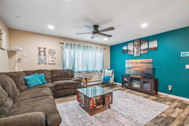 42 Richmond Blvd Unit 3B, Ronkonkoma, NY 11779 - living area featuring wood finished floors, a ceiling fan, and recessed lighting