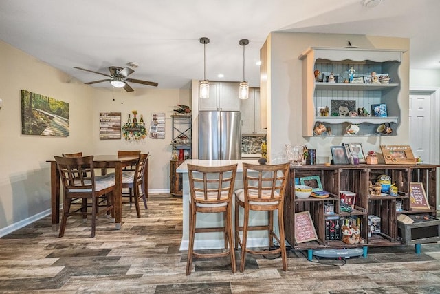 42 Richmond Blvd Unit 3B, Ronkonkoma, NY 11779 - dining space with wood finished floors and a ceiling fan