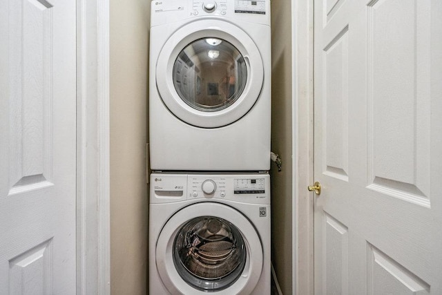 42 Richmond Blvd Unit 3B, Ronkonkoma, NY 11779 - laundry room featuring stacked washer / drying machine
