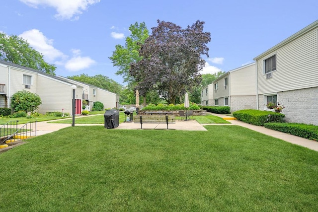 42 Richmond Blvd Unit 3B, Ronkonkoma, NY 11779 - view of home's community featuring a lawn and a residential view
