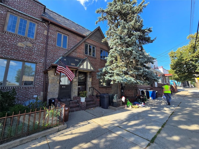69-37 Central Ave, Glendale, NY 11385 - view of front of house with brick siding and a high end roof