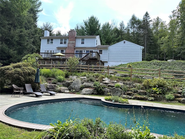 233 Upper Shad Rd, Pound Ridge, NY 10576 - view of swimming pool with a wooden deck and a patio area