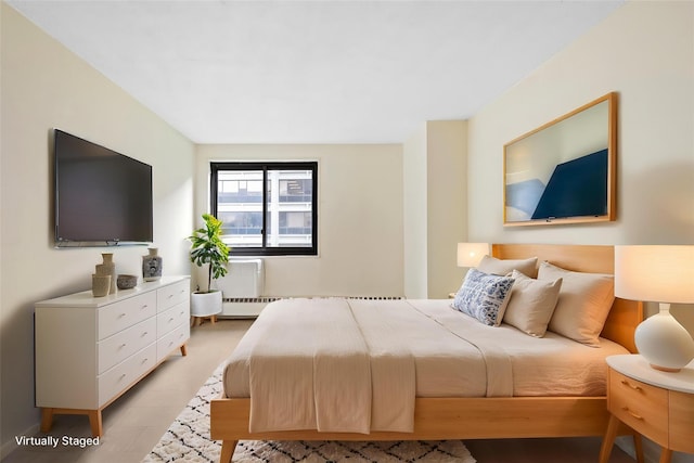 333 Pearl St Unit 8E, New York Manhattan, NY 10038 - bedroom featuring light wood-style flooring