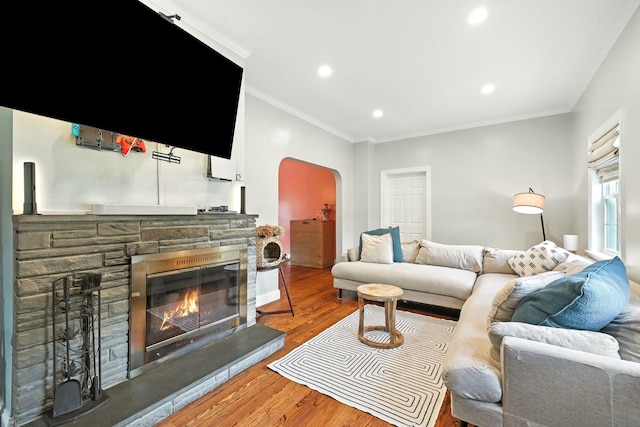 27 S Goodwin Ave, Elmsford, NY 10523 - living area with a fireplace, wood finished floors, ornamental molding, recessed lighting, and arched walkways