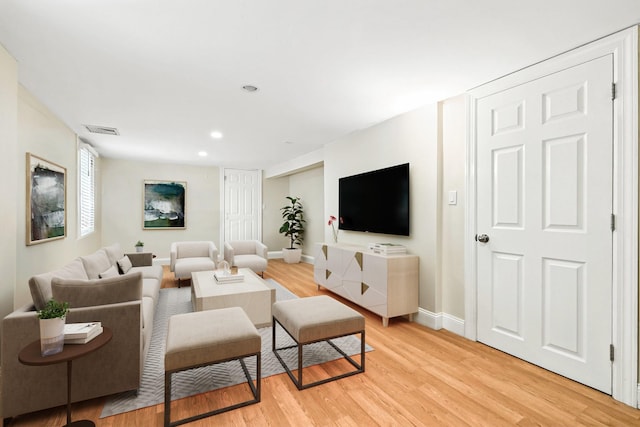 27 S Goodwin Ave, Elmsford, NY 10523 - living room with light wood-style floors and recessed lighting