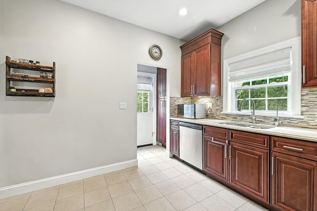 27 S Goodwin Ave, Elmsford, NY 10523 - kitchen with appliances with stainless steel finishes, backsplash, light tile patterned floors, healthy amount of natural light, and recessed lighting